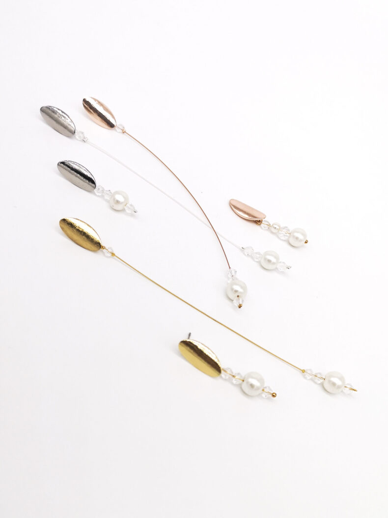 #one pearl earring long