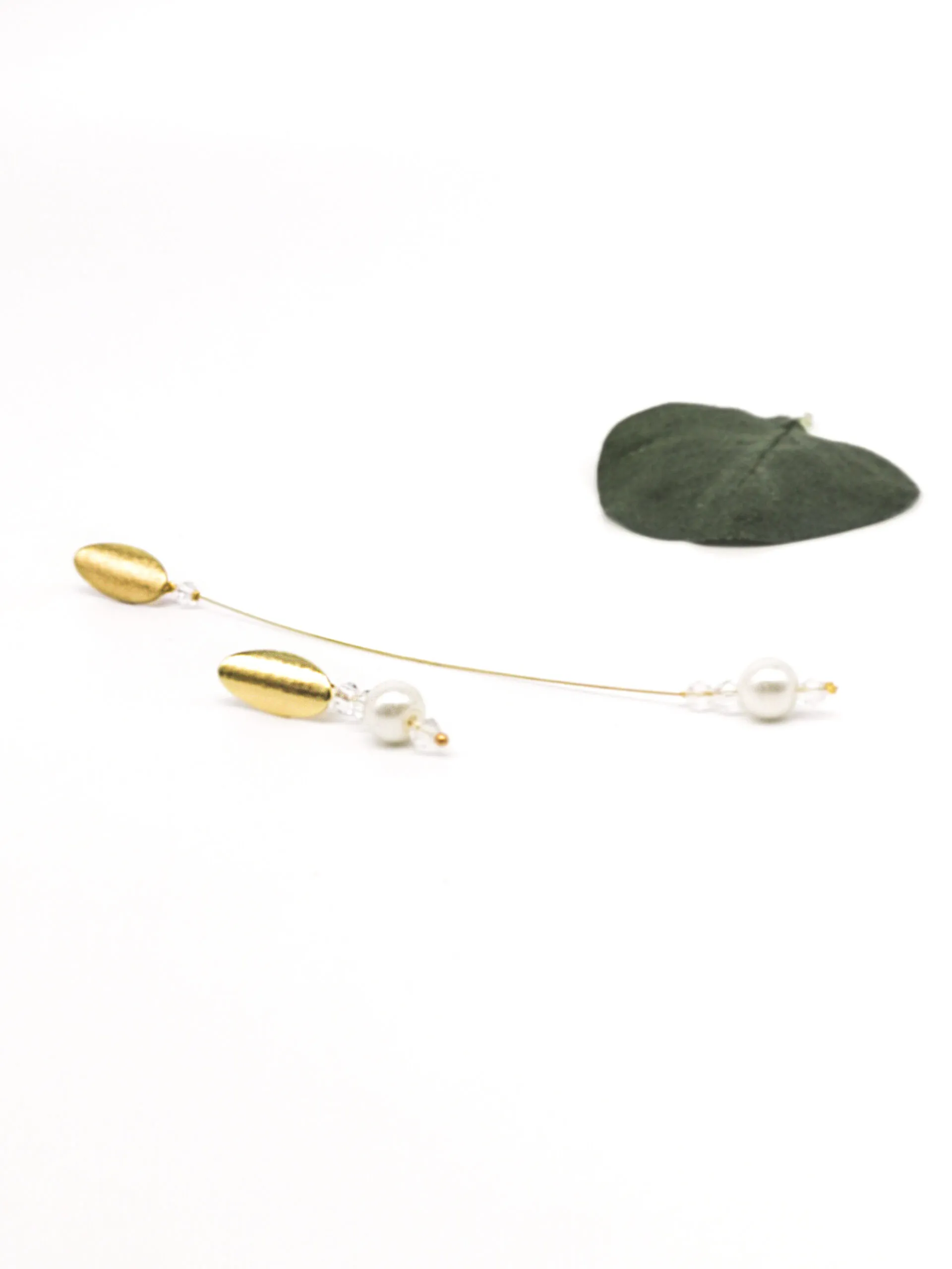 #one pearl earring long